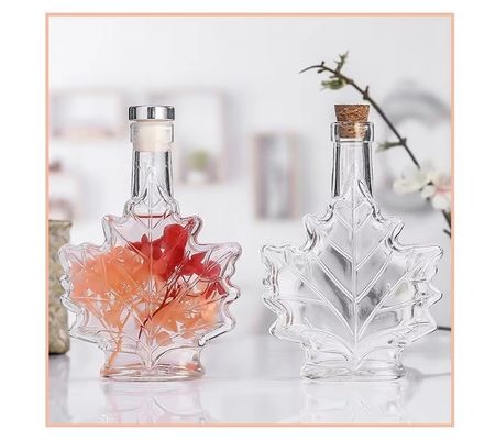 Custom Color Industrial Glass Beverage Bottle with Maple Leaf Shape 50ml 100ml 250ml