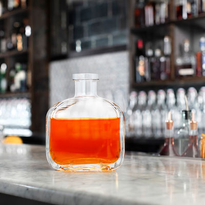 OEM/ODM Accptable 700ml 750ml Oval Shaped Liquor Glass Bottle for Liquors and Beverages