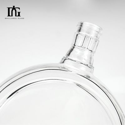 Transparent Beverage Glass Bottle with Gold Caps Frosting Surface Sophistication